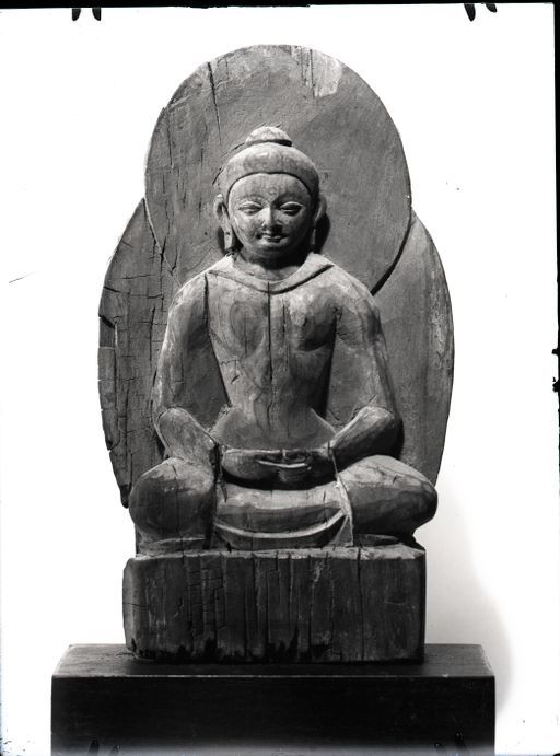 A 485: Holzstatuette: meditierender Buddha mit Mandorla und Nimbus und unverziertem Thron