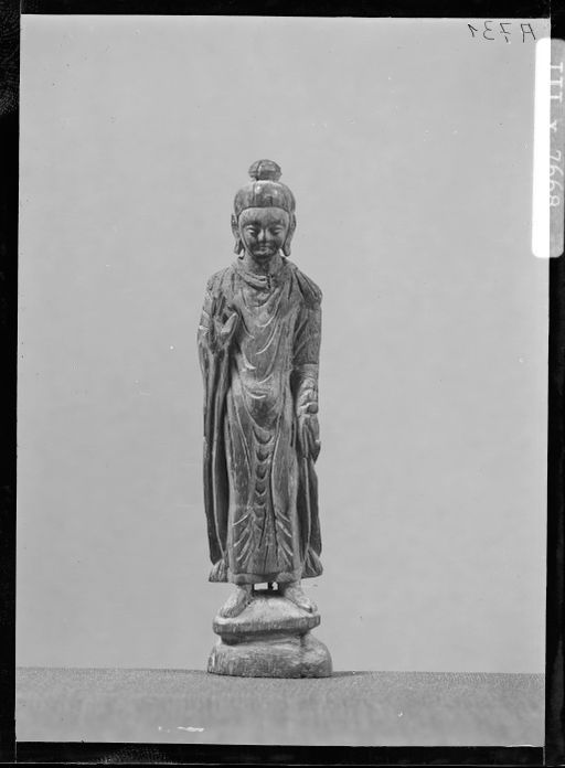 A 731: Holz Statuette eines stehenden Buddha