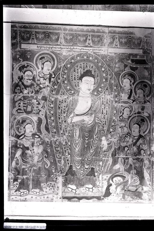 B 189: Praṇidhi-Szene Nr. 7: Die unterwürfige Verehrung des Buddha Dīpaṅkara durch den jungen Brahmanen, der sein langes Haar unter den Füßen des Buddha ausbreitet.