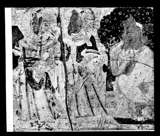 T 240: Frauen in Miedern mit Glocken wämsen, rechts ein predigender Buddha