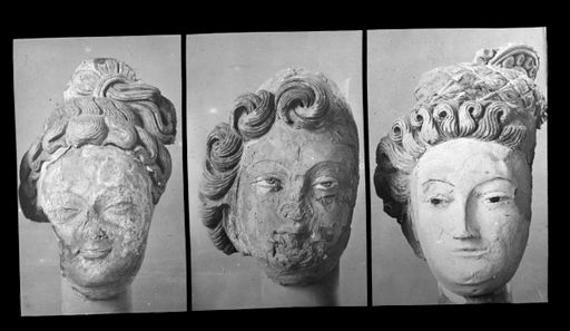 T 415: Drei Köpfe mit Lockenfrisur